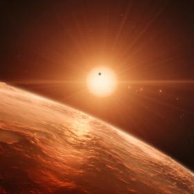 Künstlerische Darstellung der Sicht von der Oberfläche eines der Planeten im TRAPPIST-1-System © ESO/N. Bartmann/spaceengine.org