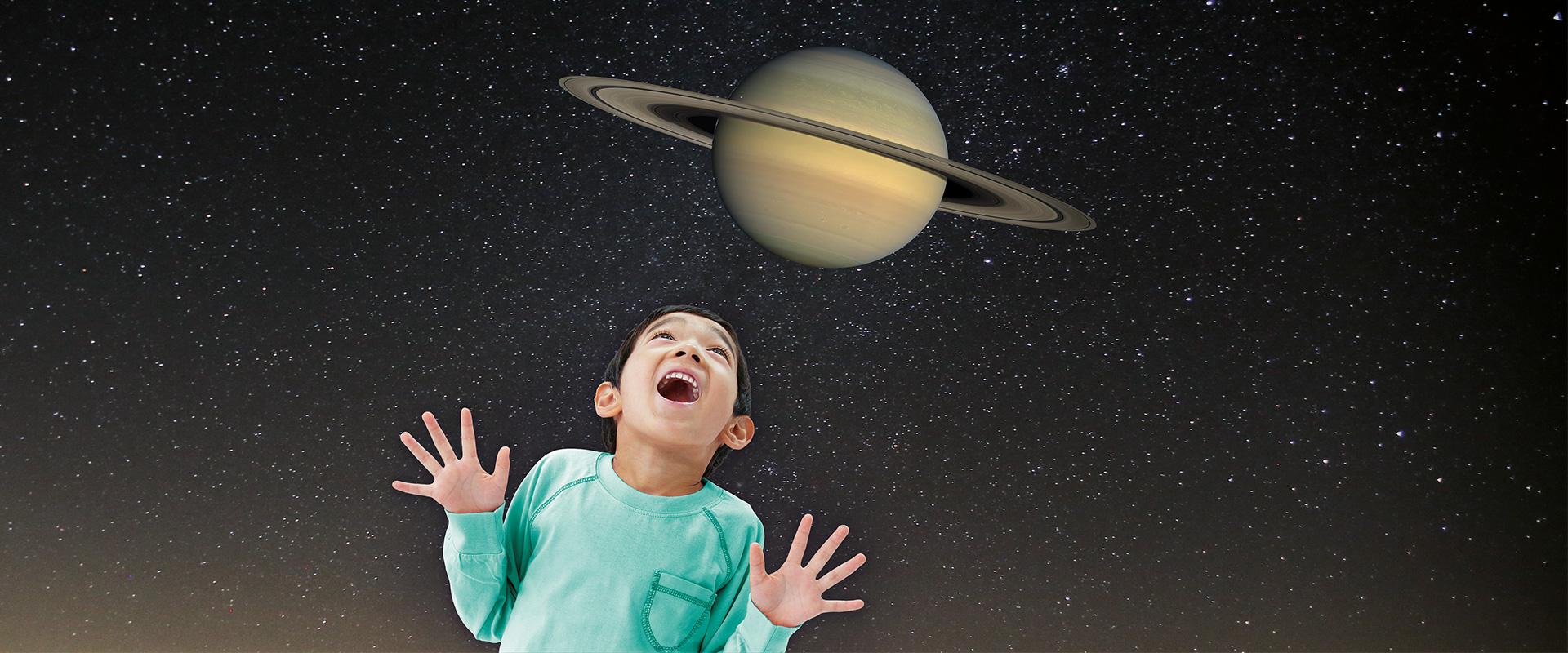 Boy with Planet Saturn